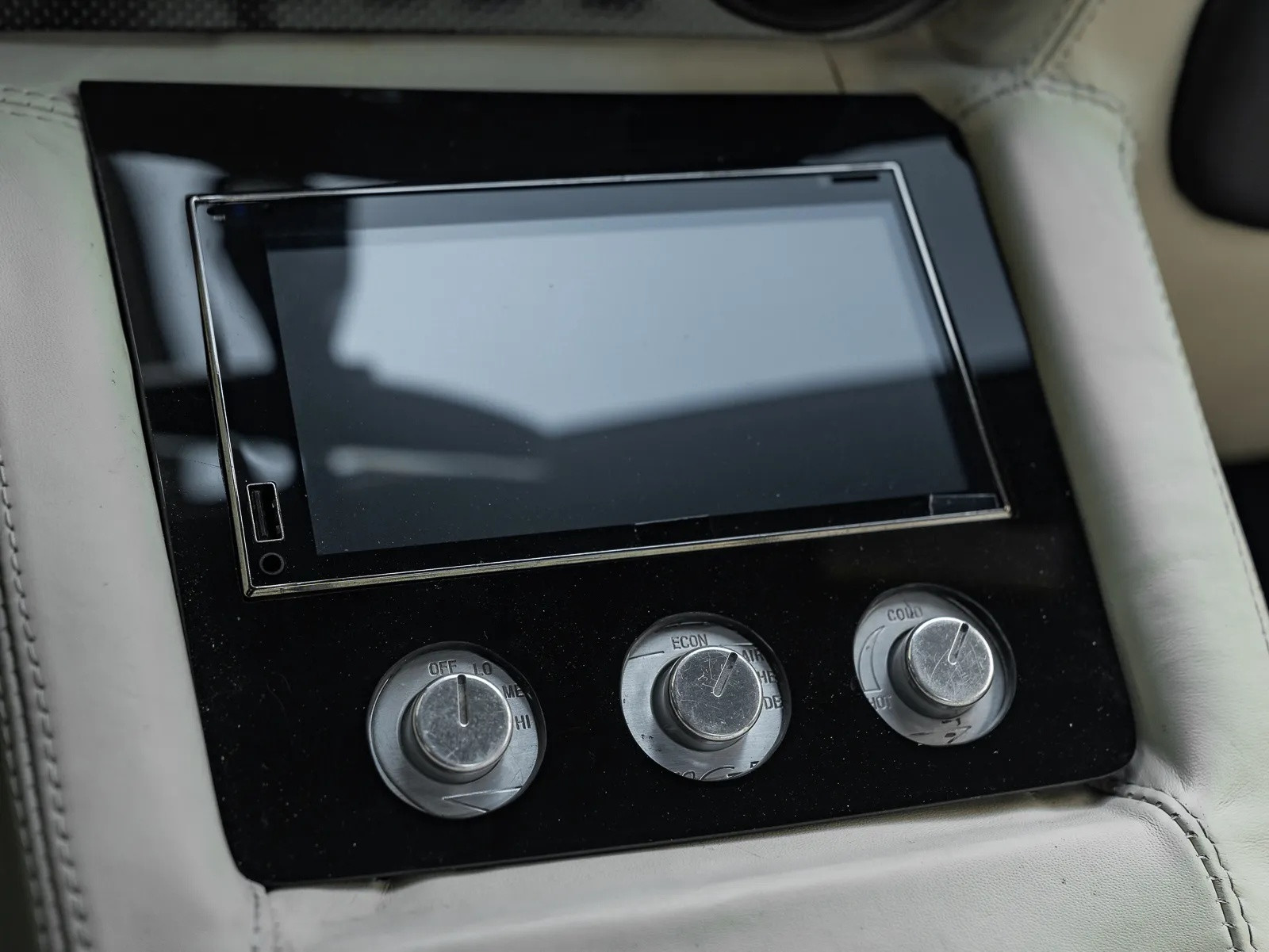 Interior shot showing the plastic panel hiding HVAC controls in the Lamborghini Diablo replica