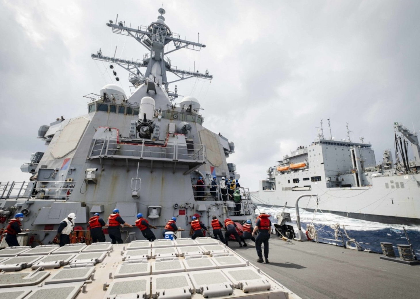 USS John S. McCain DDG 56, an Arleigh Burke-class guided-missile destroyer of the US Navy, highlighting its role in maintaining maritime presence.