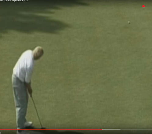 John Daly confidently walking after sinking a long putt at the 1991 PGA Championship