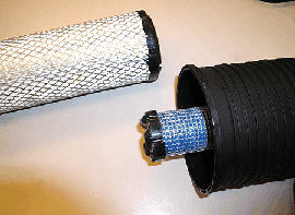 Dry-Type Air Cleaner on John Deere 3038E Tractor Engine for Enhanced Engine Protection