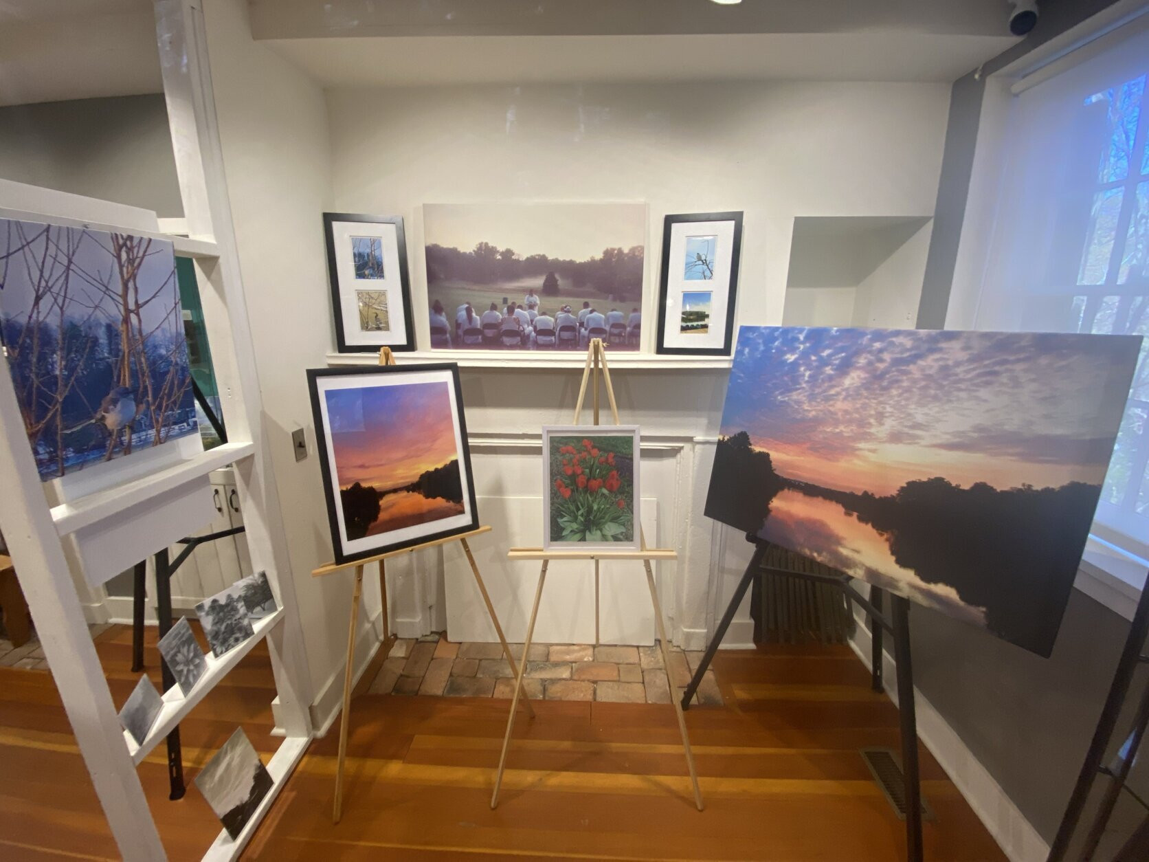 Tracy Camilla Johns discussing her photography exhibit at the Laurel Museum, Maryland, highlighting local beauty