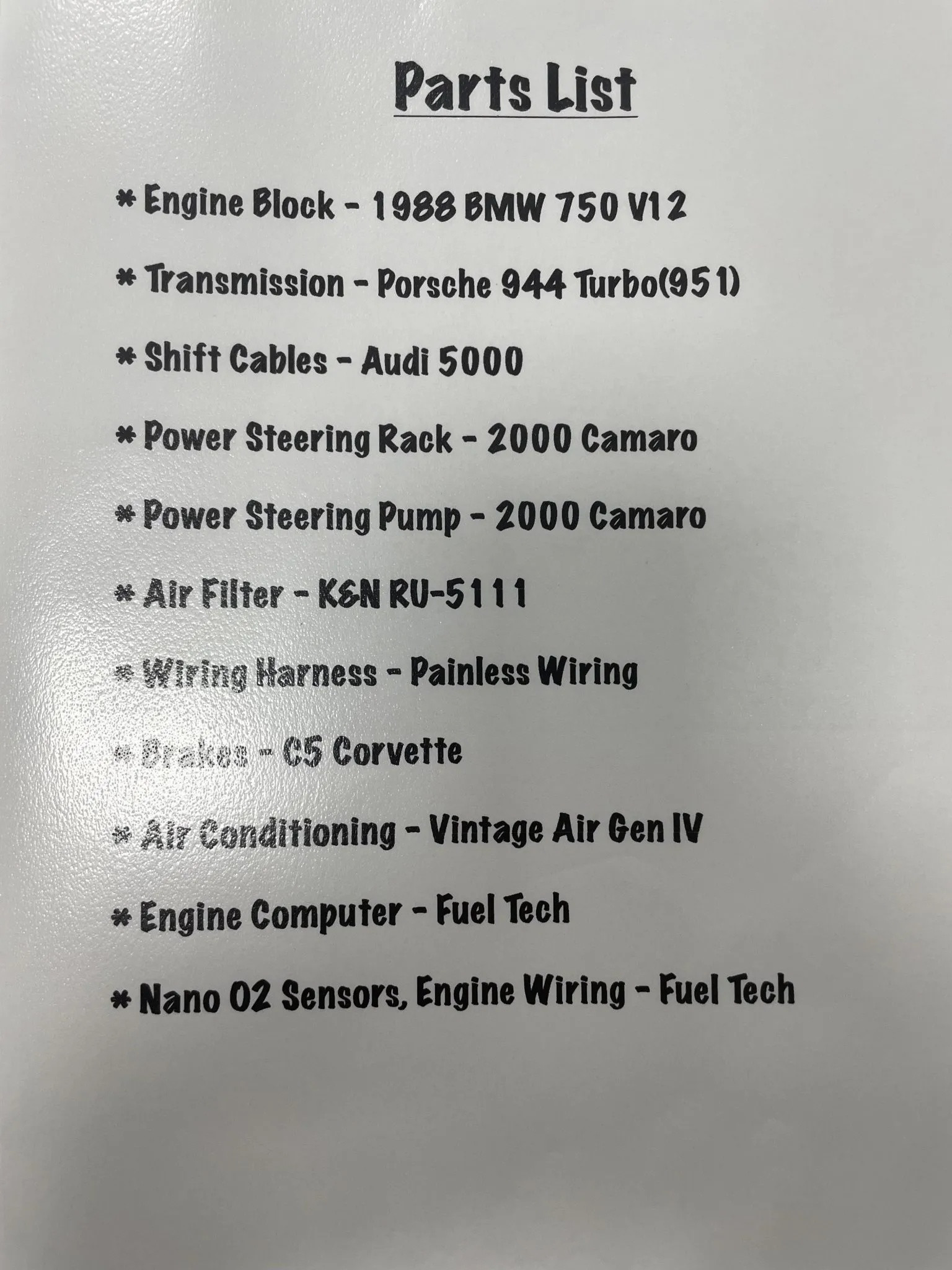 Close up of the build book detailing parts used in the Lamborghini Diablo replica