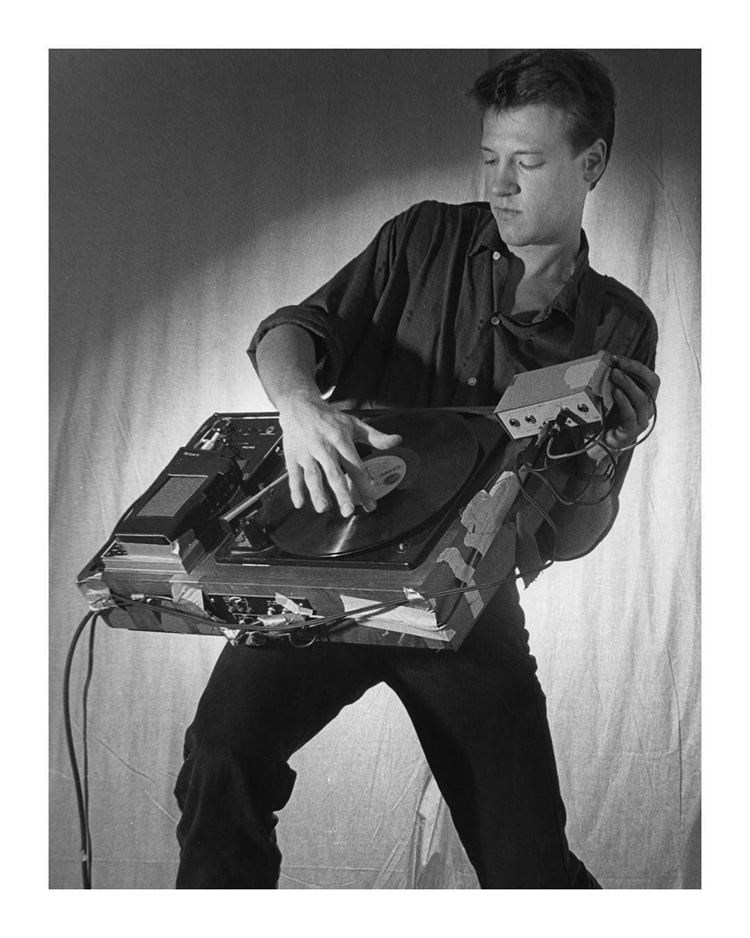 Christian Marclay in performance with phonoguitar in the 1980s new wave art scene