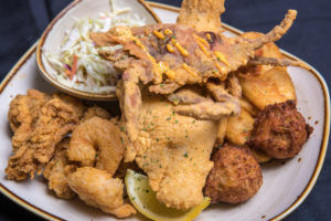 New Orleans Favorite seafood combo with soft shell crab, oysters, shrimp, and catfish at St Johns River Steak &amp; Seafood Sanford FL