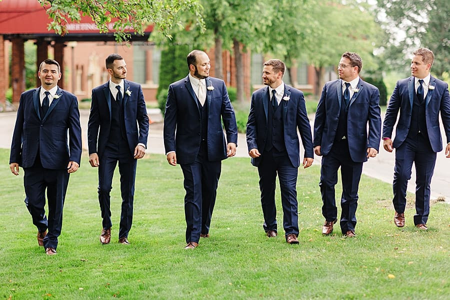 Groomsmen in classic black tuxedos, a timeless look for a wedding at The Inn at St. John's.