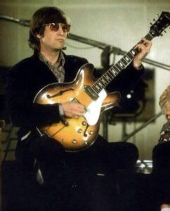 John Lennon playing his Epiphone Casino in 1966