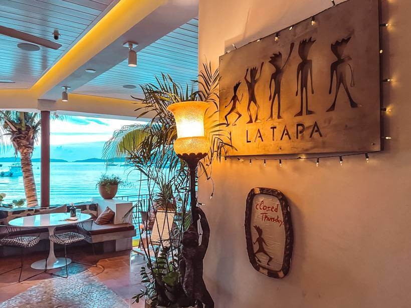 Entry to La Tapa looking onto blue waters of Cruz Bay at dusk - best restaurants st john usvi