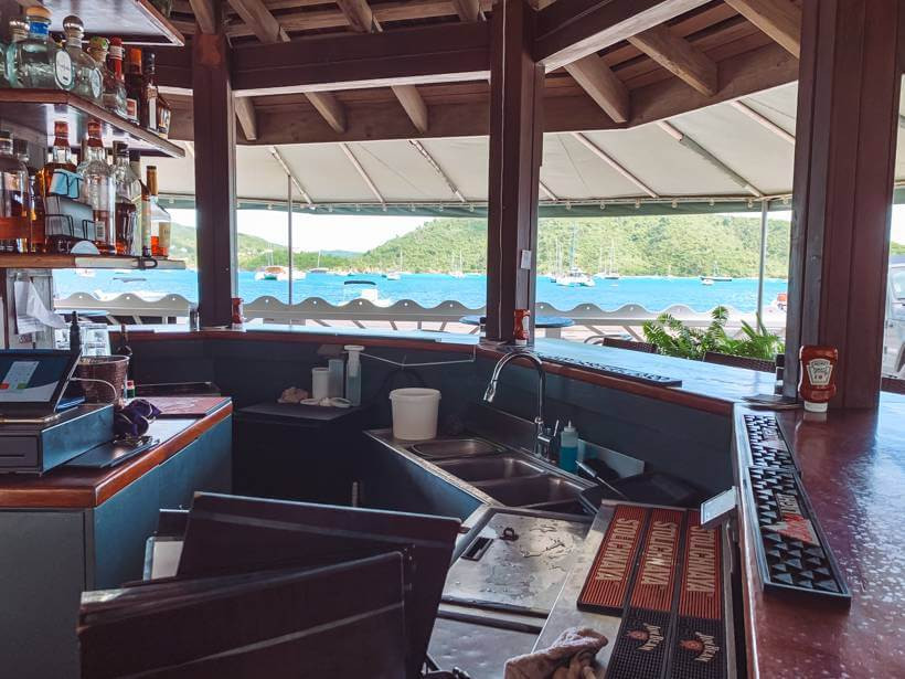Former wooden open-air structure of the Aqua Bistro bar in Coral Bay facing the water