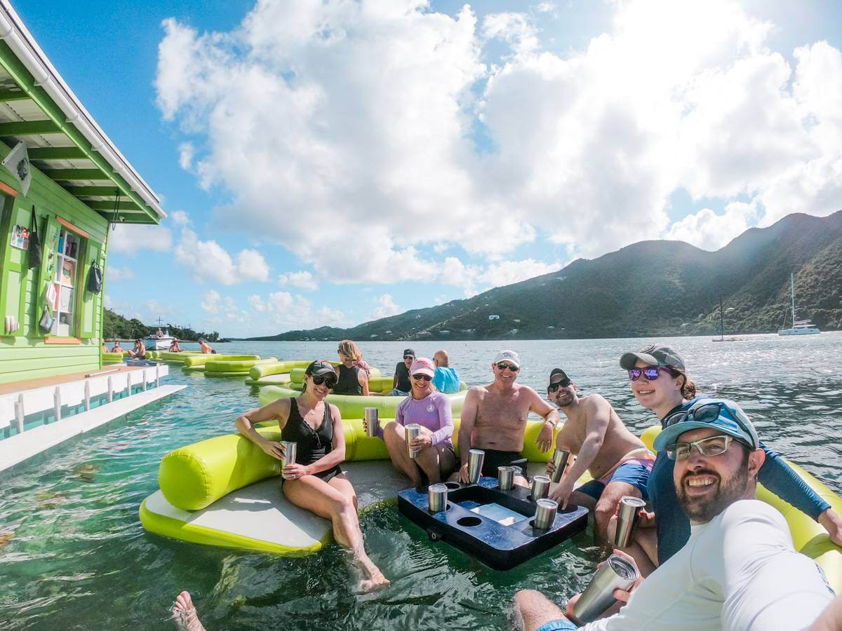 floating lime out restaurant surrounded by lily pad floats in coral bay