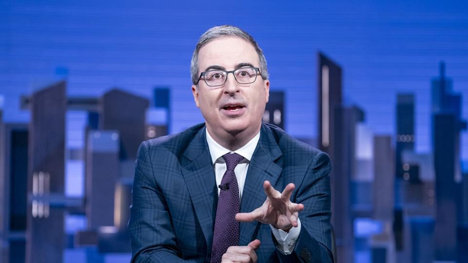 John Oliver, Last Week Tonight host, delivering a monologue with his characteristic energy and wit.