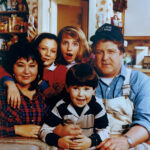 Roseanne Barr, Sara Gilbert, Lecy Goranson, John Goodman, and Michael Fishman in the TV series Roseanne (1988–97, 2018)