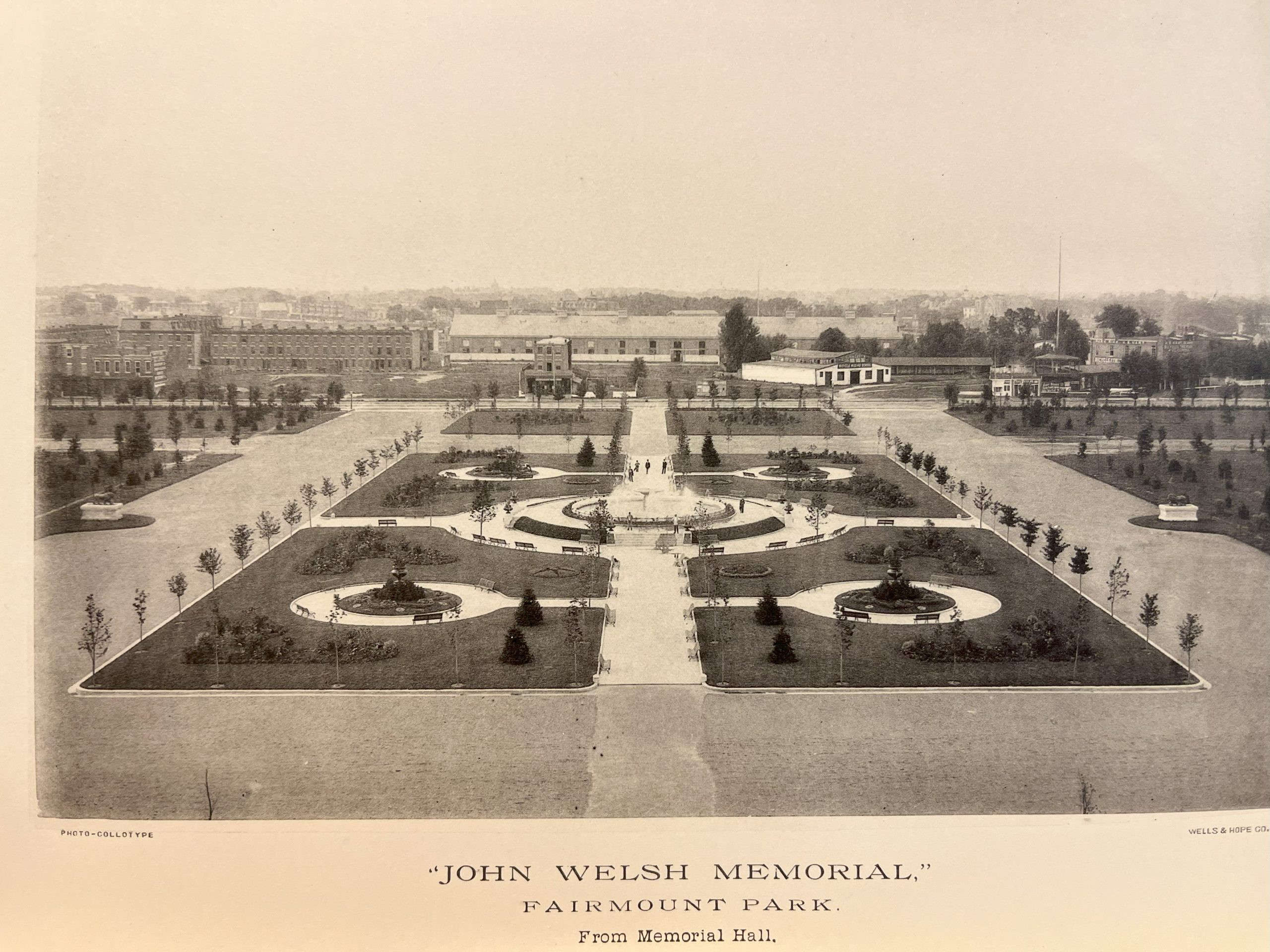 Historical image of the Welsh Fountain, looking south, showcasing its original design and surroundings